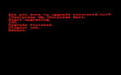 Upgrade screen with red text on black: “Upgrade finished”, “Plugout usb”, “Reboot”