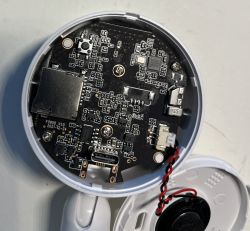 Interior of an IP camera showing a PCB with components.