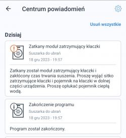 Powiadomienie o zatkanym module zatrzymującym kłaczki w suszarce Bosch.
