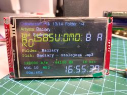 MP3 player screen showing garbled characters in the YEAR: field