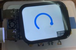 Sipeed M1s Dock Display Demonstration Display with blue arc on Sipeed M1s Dock module.
