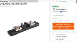Bocznik prądowy z metalowymi zaciskami na czarnej podstawce