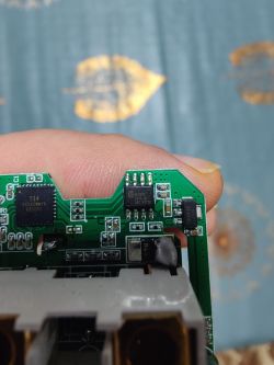 Close-up of a circuit board with visible integrated circuits like BL0937 and T34.