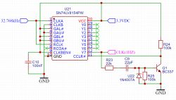 Schemat z układem SN74LV8154 dzielącym 32.768 kHz na 1 Hz z resetem tranzystorem NPN