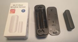 Tuya Wi-Fi Door and Window Sensor Tuya Wi-Fi door and window sensor with open casing showing battery compartment, and closed unit with branding on the packaging.