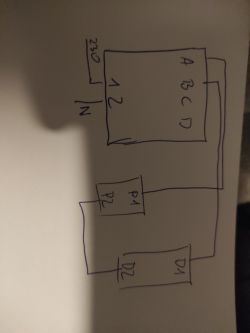 Ręczny schemat połączeń elektrycznych z etykietami A, B, C, D i innymi oznaczeniami.