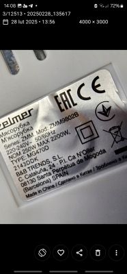 Tabliczka znamionowa urządzenia Zelmer z informacjami technicznymi i certyfikatami.
