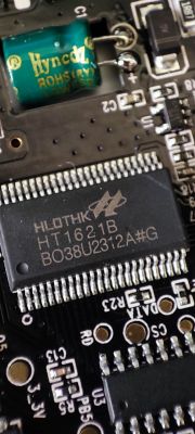 HLOTHK HT1621B Chip on Circuit Board Close-up of an HLOTHK HT1621B integrated circuit on a circuit board.