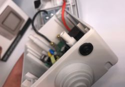 Interior of the ATLO-S1IP5-TUYA socket showing rubber gaskets and internal mounting elements.