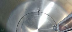 Interior of a metal Hoffek AK3502 kettle, showing part of the inner surface and a mounting component.