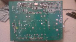Image of a circuit board with electronic components, where one resistor (R46) is highlighted with a yellow circle.