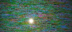 TV screen displaying colorful dots and static noise.