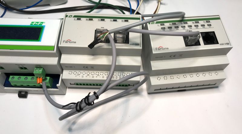 F&amp;Home building automation controllers with connected cables.