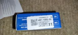 Box with label for product ZN304602_01 and QR codes