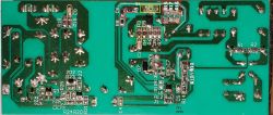 Płytka PCB z zaznaczonymi uszkodzonymi elementami zasilacza EZetil E26_32