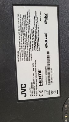 Label on the back of a JVC television with technical information.
