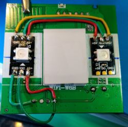 Printed circuit board with connected WS2812B LEDs and wires.