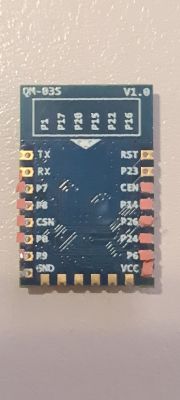 Chip module labeled QN-803S V1.0 with various pins.