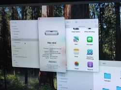 Open Mac Mini Screen with Applications Computer screen with open windows showing Mac Mini information and OpenCore-Patcher app.