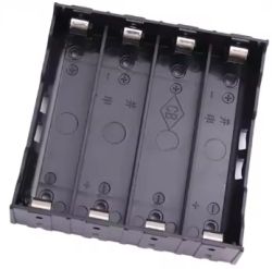 Black plastic holder for four cylindrical 18650 cells with metal terminals