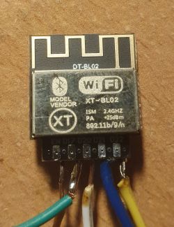 WiFi module XT-BL02 with visible wire connections.