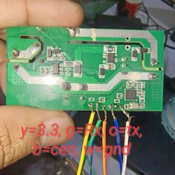 PCB with color-coded connected wires and pin function labels