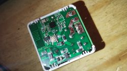 Circuit board with electronics on a wooden background.