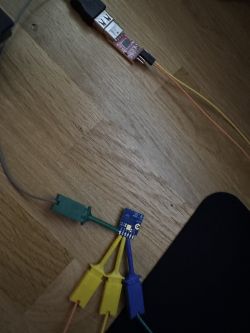 Close-up of a connected electronic module with connecting wires.