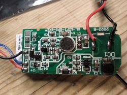 Circuit Board of LED Controller with Microphone Image of a circuit board of an electronic device with a microphone and various components.