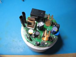 Inside of Sonoff S60TPG iPlug UK Smart Plug - Electronics Top view of the inside of a Sonoff S60TPG iPlug UK smart plug, showing electronic components on the PCB.