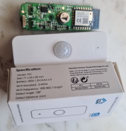 Circuit board and Tuya motion sensor box.