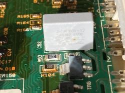 Close-up of a control board with visible electronic components.