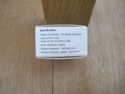 Cardboard packaging with a white label displaying the technical specifications of a wireless device.