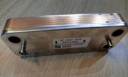 Plate heat exchanger lying on a table.