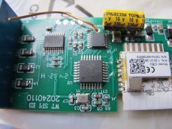 Tuya SPI LED Controller Circuit Board Close-up of a circuit board with integrated circuits and a Topazcon 16V capacitor.