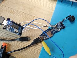Mini camera circuit board with modular camera and signal wires connected