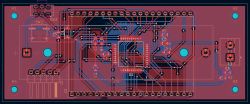 Widok projektu PCB: ścieżki czerwone i niebieskie, układ U1 na środku, złącza na krawędziach