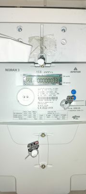 Zdjęcie licznika energii Norax 3 firmy Apator z odczytem 00000033 kWh.