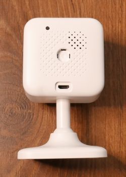 Back of white GNCC GC2 camera with visible speaker and micro USB port