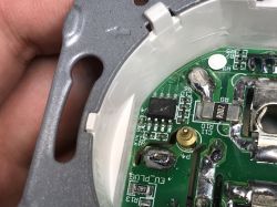 BL0937 Chip Inside the SWP86-01OG WiFi Socket Close-up of the inside of a WiFi power socket with the BL0937 chip and electronic components visible.