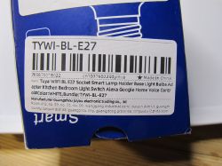 Blue Box with TYWI-BL-E27 Label Section of a blue box with a barcode and product label TYWI-BL-E27.