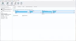 Zrzut ekranu programu Macrium Reflect pokazujący partycje dysku HDD.
