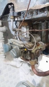 Junkers: Low Pressure & No Hot Water Issue - Cleaning Plastic Filings from Filter (Photos)
