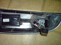 Opel corsa c 1.2 80km - Jak wymienić oświetlnie w tylnej lampie samochodu?