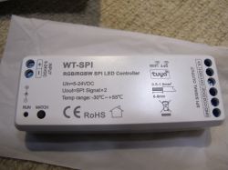 WT-SPI Tuya LED Controller Tuya WT-SPI LED controller with visible ports and labels.