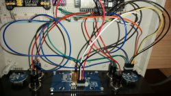 Interior of an ESP32 Module-Based Internet Radio Prototype Interior of a prototype internet radio based on the ESP32 module, with colorful wires connected to a breadboard.