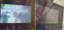 Wyświetlacz systemu monitoringu z napisem Vidos i interfejsem użytkownika.