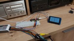 Electronic setup with an OLED display showing interference.