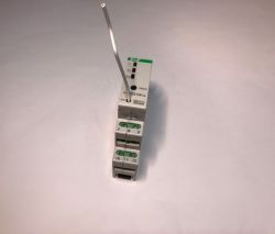DIN rail mounted radio controller with protruding antenna and screw terminals.