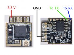 Two electronic boards with labels 3.3 V, GND, TX, and RX.